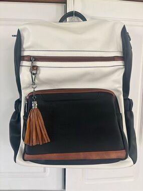 Women's White and Black Backpack with Brown Tassel Accent